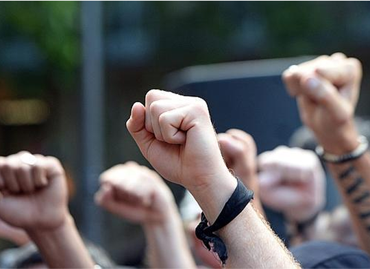 Raised fists